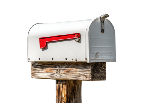 Weathered white mailbox with red flag atop wooden post