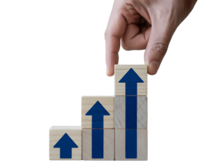 Hand stacking wooden blocks isolated on transparent background