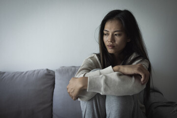 Tired, headache and stress of woman in living room with mental health, fatigue and sad problem. Face, depression and frustrated male person with anxiety, brain fog or crisis of failure.