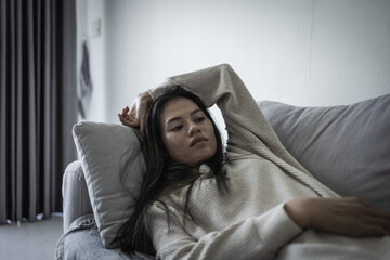 Tired, headache and stress of woman in living room with mental health, fatigue and sad problem. Face, depression and frustrated male person with anxiety, brain fog or crisis of failure.