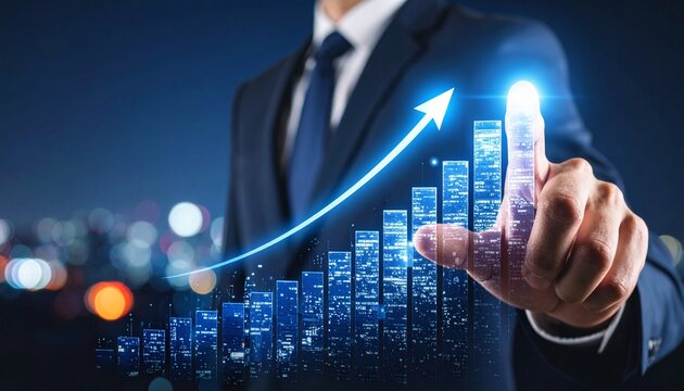 Businessman in suit pointing at glowing upward graph with city lights in background.