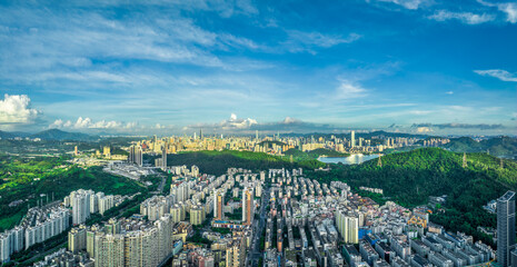 Obraz premium Aerial panoramic view of a modern city with dense residential districts in Shenzhen.