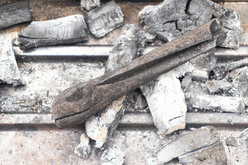 Charcoal, created by slowly burning wood.