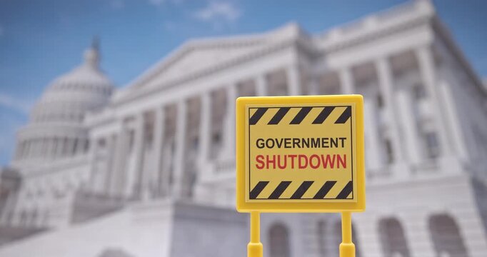 &ldquo;Government Shutdown&rdquo; caution sign in front of the Capitol. Symbol of U.S. budget conflict, federal service halt, and global economic concerns after Trump&ndash;Xi diplomatic talks.