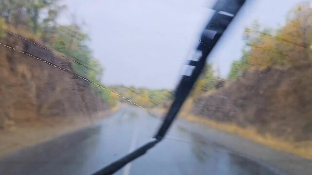 Driving along a wet forest road on a rainy autumn day through Zagros oak forests, showing moody nature, winding road, and seasonal landscape.
📍Marivan, Kurdistan 