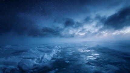 Naklejka premium Vast frozen terrain stretches under a dramatic cloud filled night sky dotted with countless stars evoking a sense of cold remote wilderness