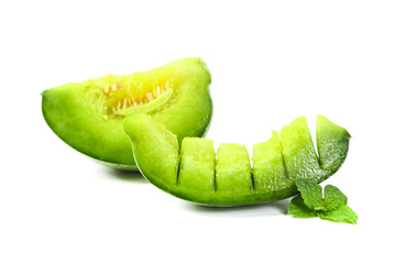 Fresh Green Melon Slices with Mint Leaves Isolated on White Background