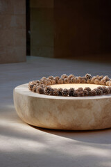 table adorned with pine cones surrounded by ultrabright ar sparkles creating captivating atmosphere