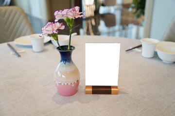Stand Mock up Menu frame tent card. Menu card with empty space for text on table.