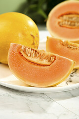 Fresh Yellow Honeydew Melon Slices on White Marble Surface - Healthy Fruit Display