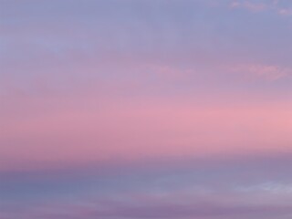 Fototapeta premium Beautiful pink Sky real Scenery : For just a brief moment before the sun sets, the sky transforms into a breathtaking spectacle, painted in soft shades of tricolor.