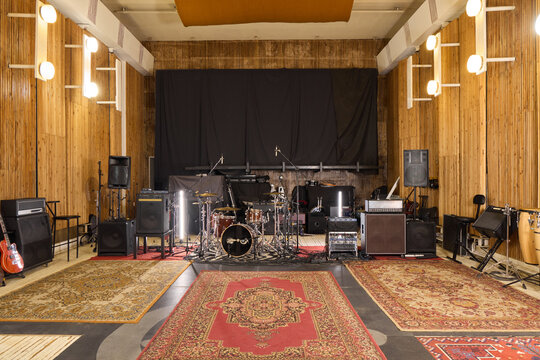 Large music studio with instruments and equipment ready for recording