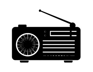 Black silhouette of a vintage radio with an antenna and a circular dial on white