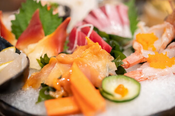 Fresh sashimi set serve on ice with wasabi Japanese style