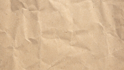 Abstract crumpled and creased recycle brown paper texture background