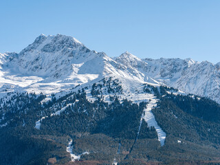 Karakol Ski Resort Runs with Przhevalsky Peak in Background