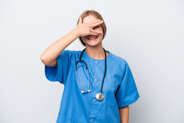 Young nurse doctor woman isolated on white background covering eyes by hands and smiling