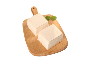 Fresh White Tofu Blocks on Wooden Cutting Board with Herb Garnish for Healthy Vegetarian Vegan Cooking