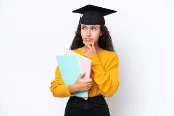Arab university graduate woman holding books isolated on white background having doubts