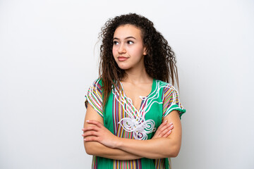 Young Arab woman isolated on white background looking to the side