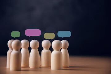 Wooden peg dolls with colorful speech bubbles, communication, Speak