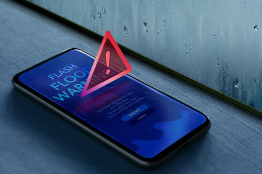 Smartphone shows flash flood alert, Climate change, Technology for safety