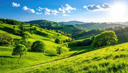 Obraz premium Vibrant Green Rolling Hills Under Bright Blue Sky and Sunlight