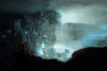 Dark abstract texture with luminous energy pattern