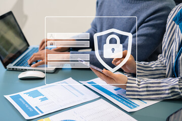 Person hand typing login and password in the concept of cyber security.
