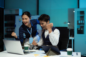Successful business team, work complete, success at work in the office concept, employees working overtime.