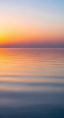 Obraz premium Serene Sunset Over Calm Waters - A Symphony of Colors.