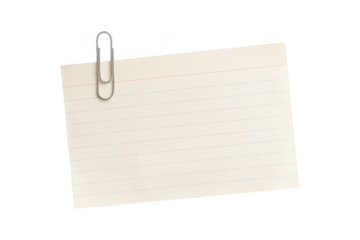 A single blank white paper note attached to a black background with a silver metal paperclip