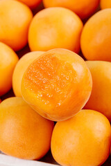 Fresh Shaanxi Apricots Cut in Half Showing Juicy Orange Flesh - Healthy Organic Stone Fruit from China