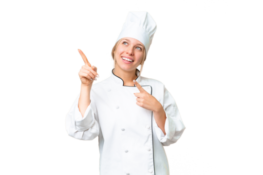 Young chef woman over isolated chroma key background pointing with the index finger a great idea