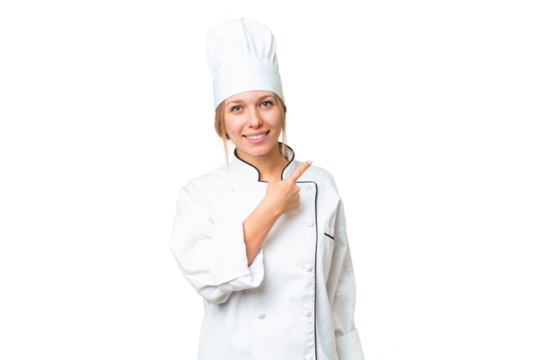 Young chef woman over isolated chroma key background pointing to the side to present a product