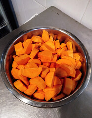 Freshly chopped sweet potatoes ready for cooking