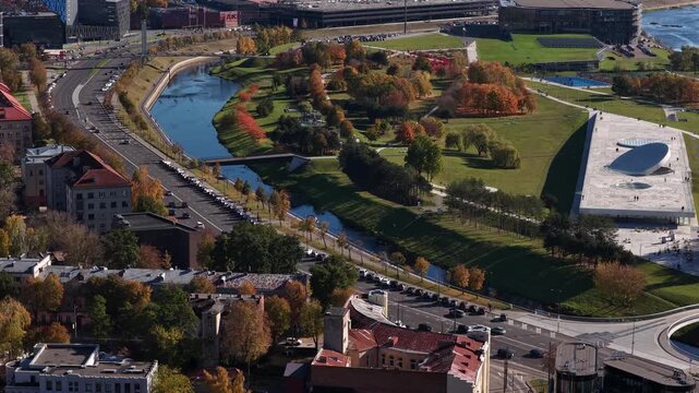 Aerial View of Neris River Embankment, Urban Park, and City Streets in Kaunas, Lithuania