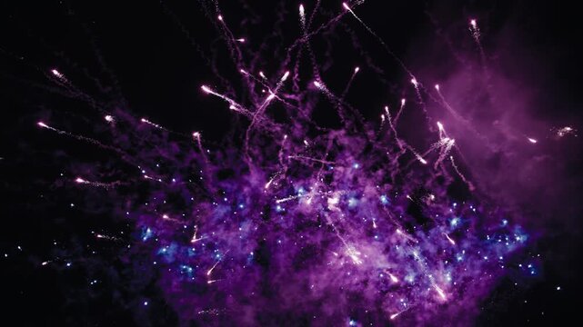 Sudden Overwhelming Vibrant Purple and Blue Fireworks Against Night Sky, Rich Color and Motion, Bright Sparks and Smoke Trails