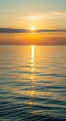 Obraz premium Golden Sunset Reflections on Calm Ocean Waters, Peaceful Horizon.