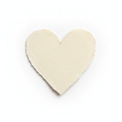 A simple cream colored heart shape cut from textured paper isolated on a white background