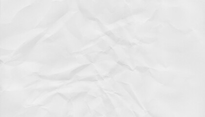 Crumpled white paper texture with soft shadows, ideal for backgrounds or design elements