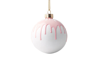 White Christmas ornament ball with soft pink dripping design pattern hanging from gold chain cord, isolated on a transparent background