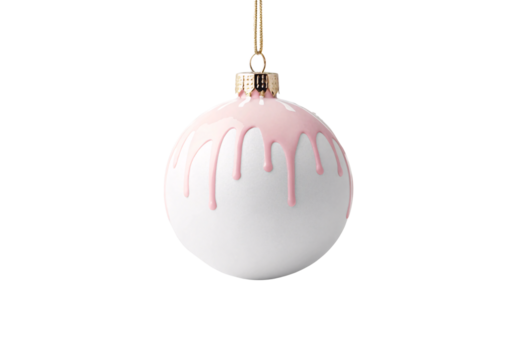 White Christmas ornament ball with soft pink dripping design pattern hanging from gold chain cord, isolated on a transparent background