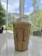 Ice coffee cup on the table