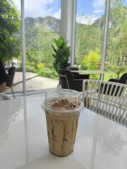 Ice coffee cup on the table