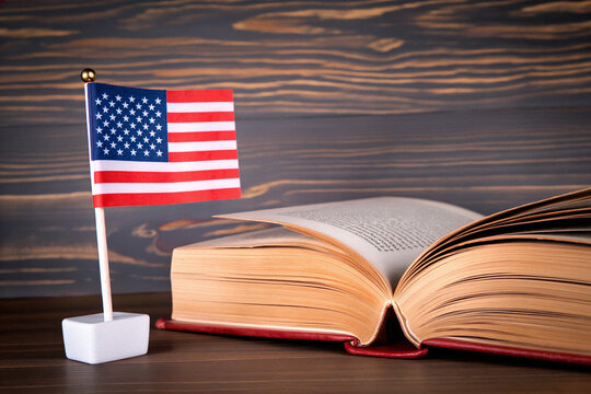 American flag and open book representing civics education