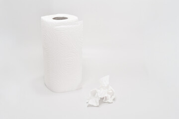 Paper towels on a clean surface with white background
