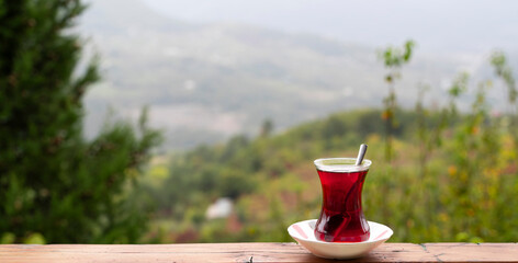 Traditional Turkish Tea with a Scenic Mountain View