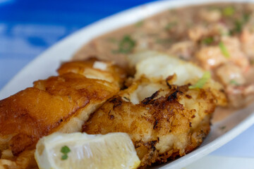 Breaded and fried Patagonian black hake served with Argentine crab salad