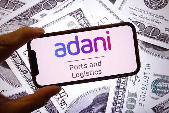Konskie, Poland - September 28, 2025: Adani Ports and SEZ company logo displayed on mobile phone